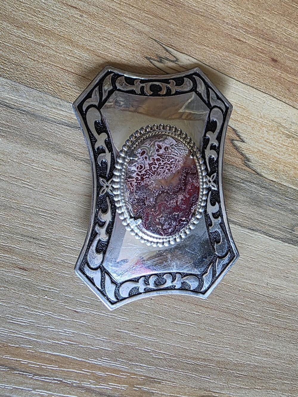 Vintage Ornate Silver-Tone Floral Cameo Brooch with Red Accent